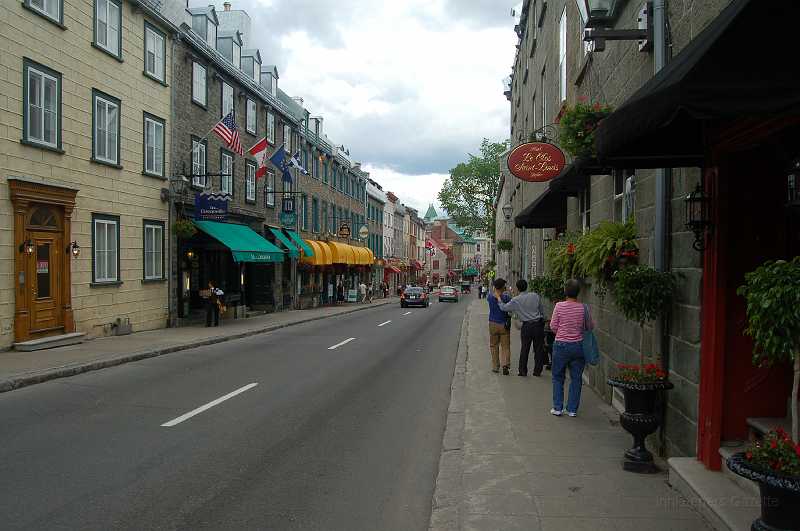 Canada East Tour 2006057.JPG - The colorful awnings reminded me of streets in Italian towns.